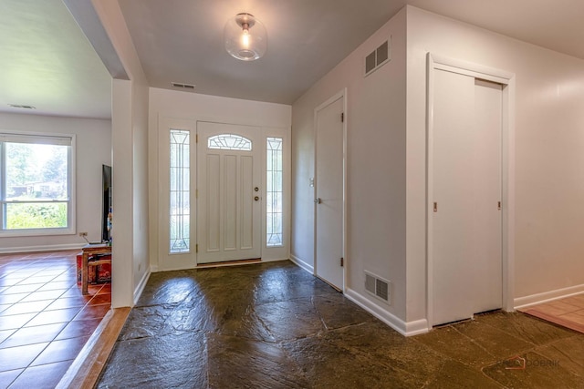 16 Yorkshire Dr, Lincolnshire, IL 60069 - foyer entrance featuring baseboards and stone finish floors