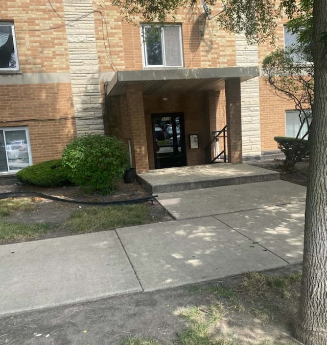 5209 S Leclaire Ave Unit 3B, Chicago, IL 60638 - view of exterior entry with brick siding