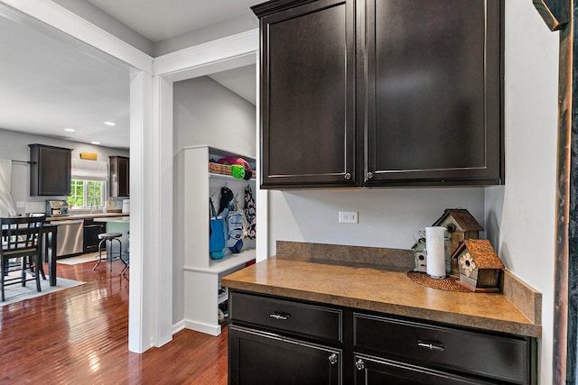 3512 Chancery Ln, Carpentersville, IL 60110 - kitchen featuring dark wood-type flooring, dishwasher, dark cabinetry, and recessed lighting