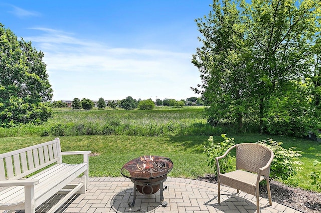 3512 Chancery Ln, Carpentersville, IL 60110 - view of patio featuring a fire pit