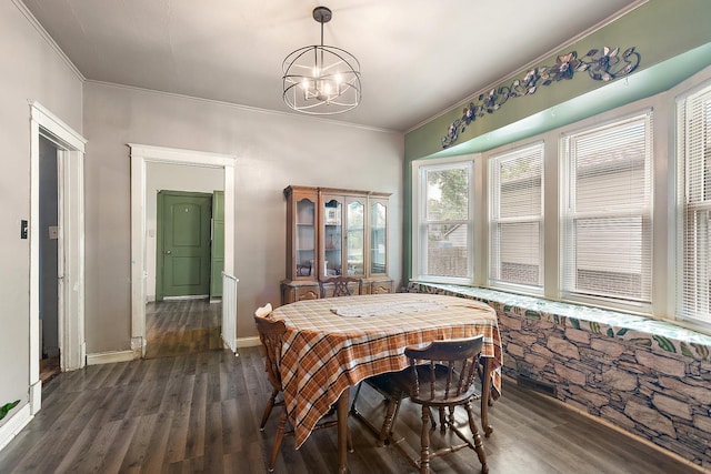 18329 Klimm Ave, Homewood, IL 60430 - dining space with dark wood finished floors, a chandelier, and ornamental molding