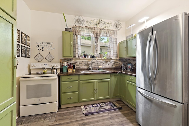 18329 Klimm Ave, Homewood, IL 60430 - kitchen with freestanding refrigerator, green cabinets, white range with electric stovetop, dark countertops, and tasteful backsplash