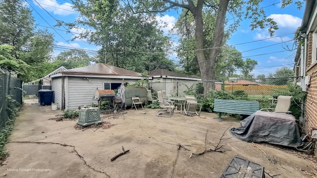 10240 S Torrence Ave, Chicago, IL 60617 - fenced backyard with a patio area and a grill