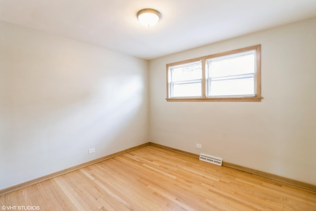 3671 Sarah St, Franklin Park, IL 60131 - empty room featuring light wood finished floors