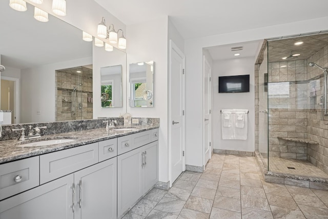19466 W Aspen Dr, Mundelein, IL 60060 - full bath featuring double vanity, a stall shower, marble look tiles, and recessed lighting