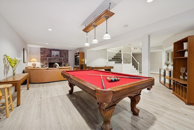 19466 W Aspen Dr, Mundelein, IL 60060 - playroom featuring light wood-type flooring, a stone fireplace, recessed lighting, and billiards table