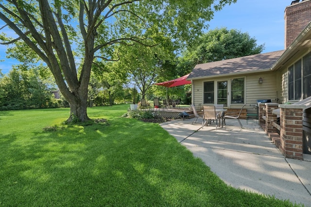 19466 W Aspen Dr, Mundelein, IL 60060 - view of green lawn with a patio area