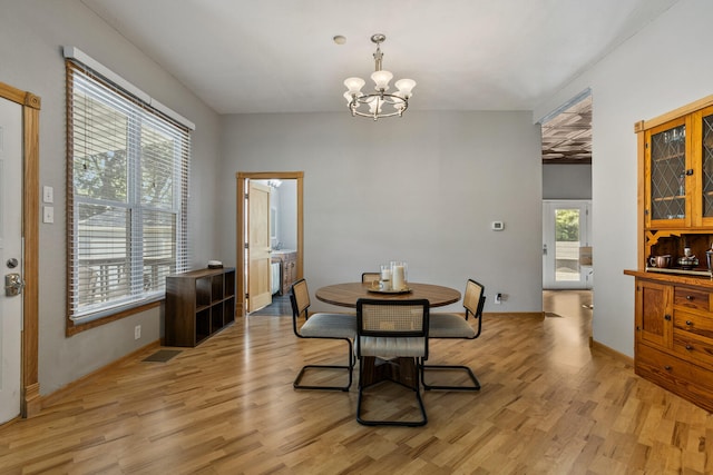 206 W N St, Leroy, IL 61752 - dining space with a chandelier and light wood finished floors