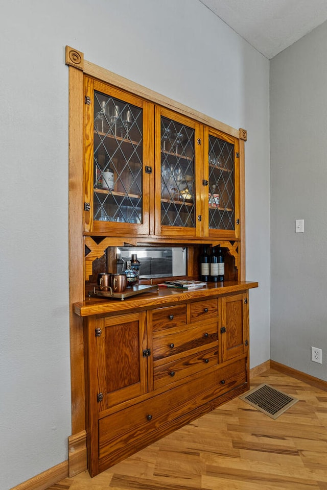 206 W N St, Leroy, IL 61752 - indoor dry bar with baseboards and wood finished floors