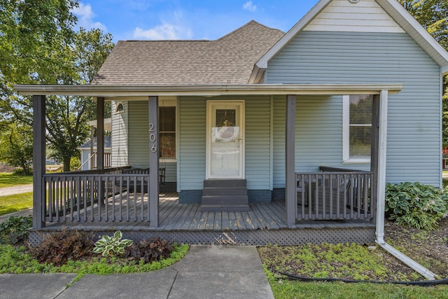 206 W N St, Leroy, IL 61752 - view of front of home featuring a porch and roof with shingles