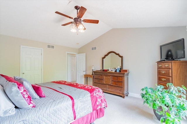 2236 Boulder Dr, Normal, IL 61761 - bedroom with vaulted ceiling, light carpet, and a ceiling fan
