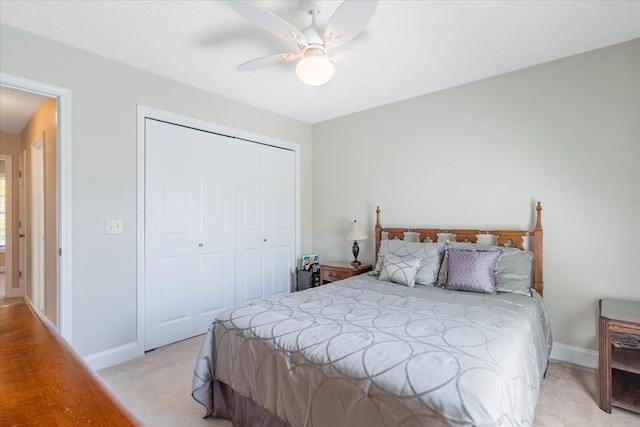 2236 Boulder Dr, Normal, IL 61761 - bedroom featuring light colored carpet, a closet, and ceiling fan