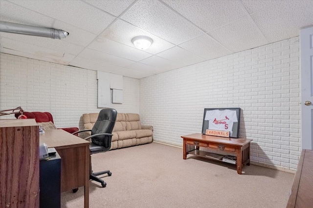 2236 Boulder Dr, Normal, IL 61761 - office area featuring brick wall, a drop ceiling, and carpet floors