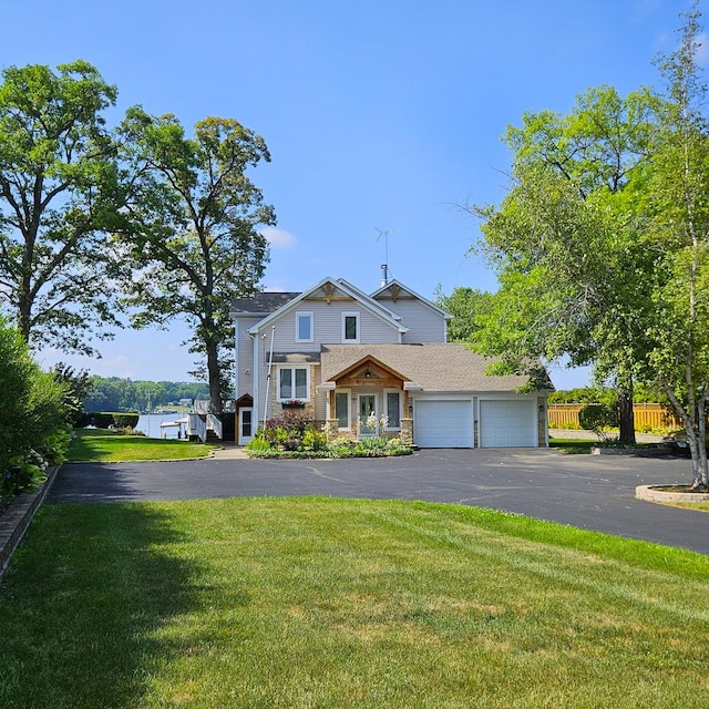 25333 W Richmond Ave, Antioch, IL 60002 - view of front of home featuring an attached garage and asphalt driveway