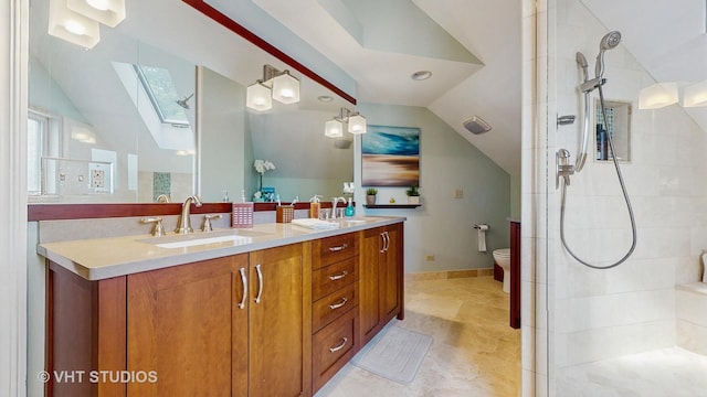 25333 W Richmond Ave, Antioch, IL 60002 - bathroom with a skylight, lofted ceiling, a tile shower, and double vanity