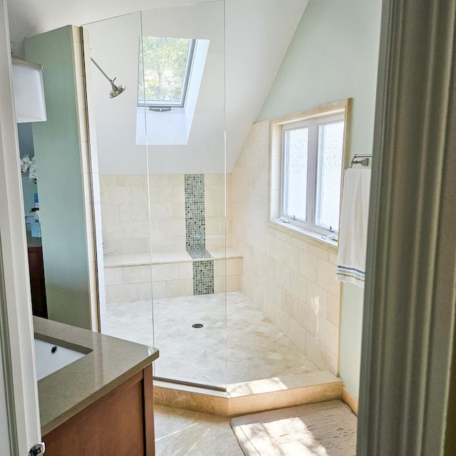 25333 W Richmond Ave, Antioch, IL 60002 - full bathroom featuring lofted ceiling, tiled shower, vanity, and a skylight