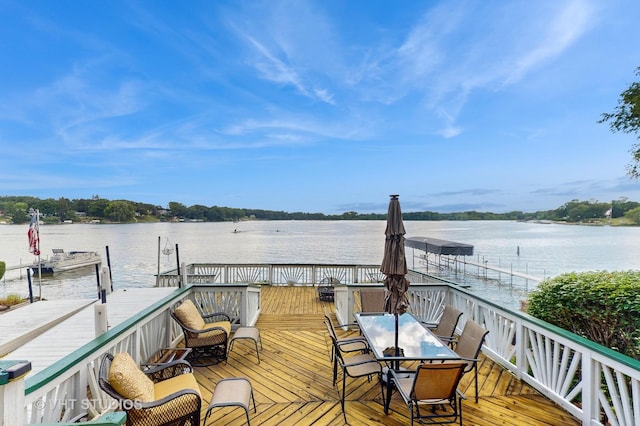 25333 W Richmond Ave, Antioch, IL 60002 - deck featuring a water view, a boat dock, and outdoor dining area