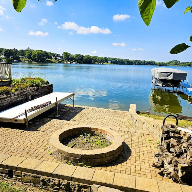 25333 W Richmond Ave, Antioch, IL 60002 - dock with boat lift, a water view, and a fire pit