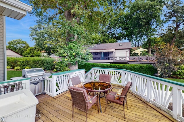 25333 W Richmond Ave, Antioch, IL 60002 - wooden terrace with grilling area and outdoor dining space
