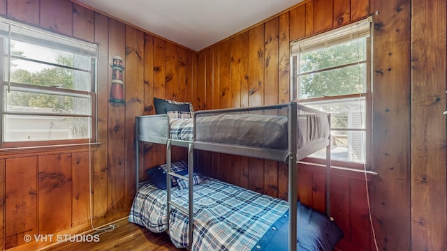 25333 W Richmond Ave, Antioch, IL 60002 - bedroom with multiple windows, wood walls, and wood finished floors