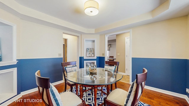 25333 W Richmond Ave, Antioch, IL 60002 - dining room featuring wood finished floors and a raised ceiling