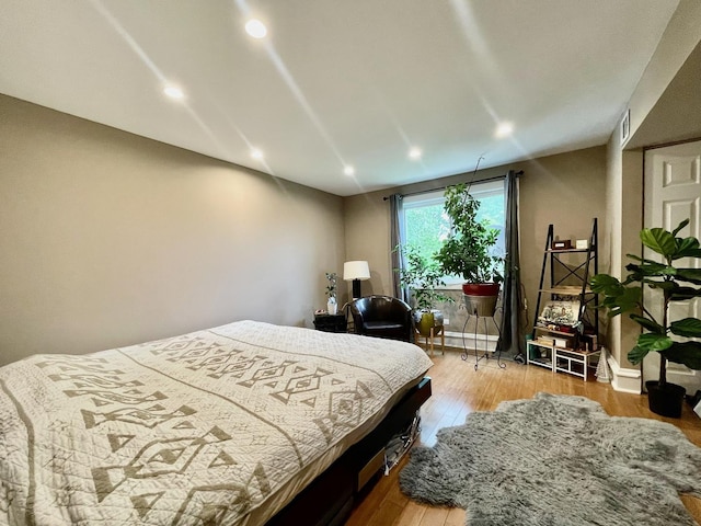 5511 Chateau Dr Unit 5, Rolling Meadows, IL 60008 - bedroom with wood finished floors and recessed lighting
