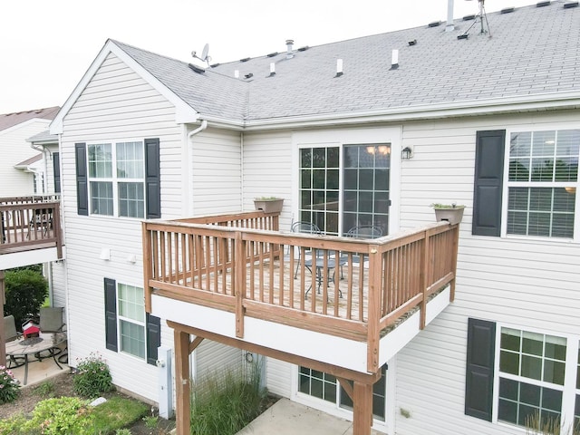 1077 Marcello Dr, Hampshire, IL 60140 - back of house featuring roof with shingles and a deck