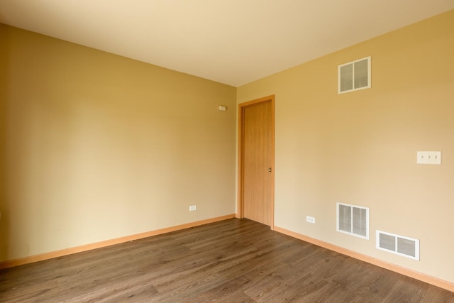 1077 Marcello Dr, Hampshire, IL 60140 - spare room with dark wood-type flooring and baseboards