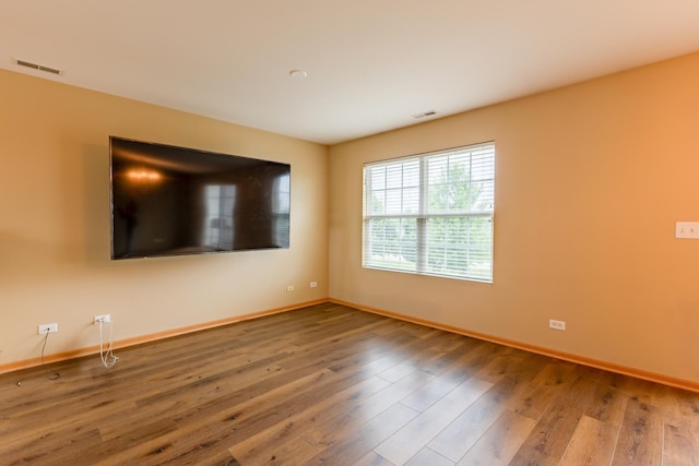 1077 Marcello Dr, Hampshire, IL 60140 - empty room featuring baseboards and wood finished floors
