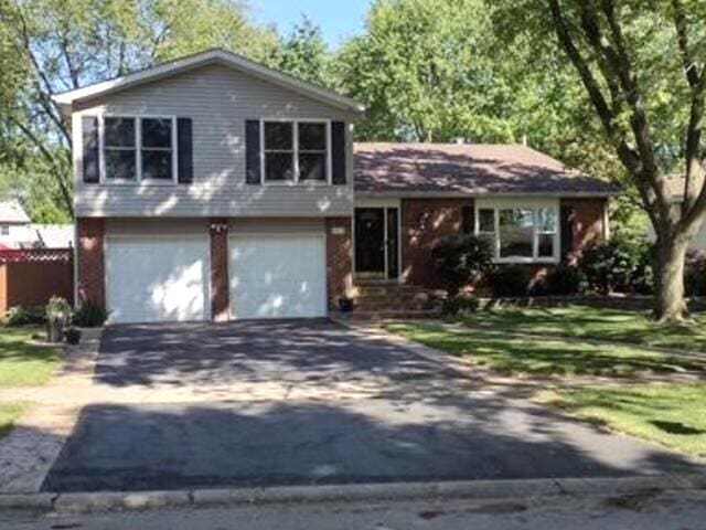 1312 Frederick Ln, Naperville, IL 60565 - tri-level home with driveway and an attached garage