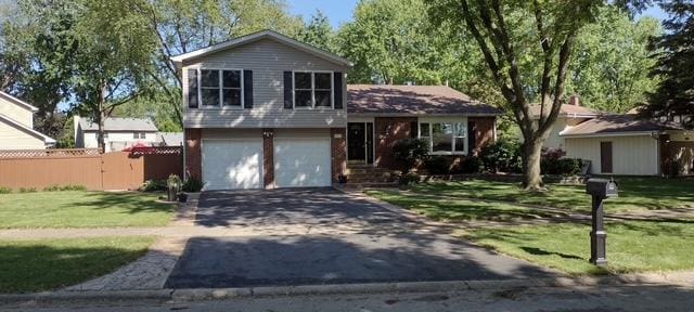 1312 Frederick Ln, Naperville, IL 60565 - tri-level home featuring driveway and a garage