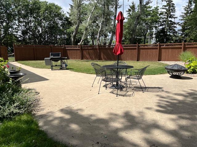 1312 Frederick Ln, Naperville, IL 60565 - view of patio featuring a fire pit