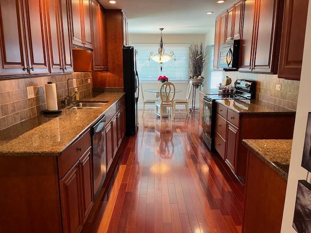 1312 Frederick Ln, Naperville, IL 60565 - kitchen featuring electric range, dark wood-style flooring, freestanding refrigerator, dark stone counters, and recessed lighting