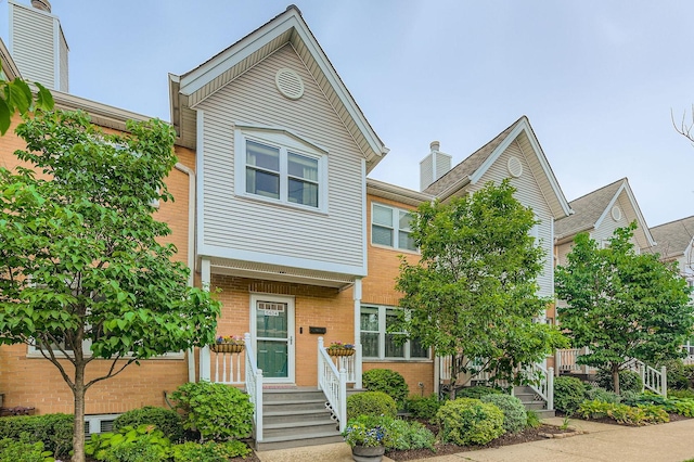 5404 N Hoyne Ave Unit 5404, Chicago, IL 60625 - townhome / multi-family property featuring brick siding