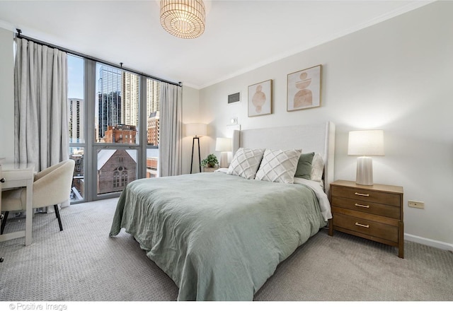 600 N Dearborn St Unit 701, Chicago, IL 60654 - bedroom with light carpet, ornamental molding, and a wall of windows