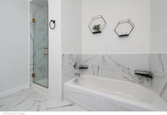 600 N Dearborn St Unit 701, Chicago, IL 60654 - bathroom with a bath, a marble finish shower, and marble finish floors