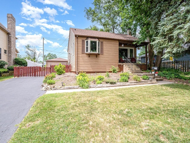 316 S Park St, Westmont, IL 60559 - view of front of house with a chimney and driveway