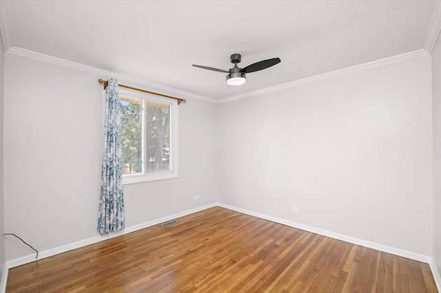 9451 Elm Ave, Mokena, IL 60448 - empty room featuring a ceiling fan, wood finished floors, and crown molding