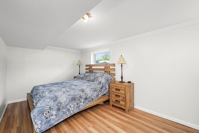 9451 Elm Ave, Mokena, IL 60448 - bedroom featuring wood finished floors and crown molding