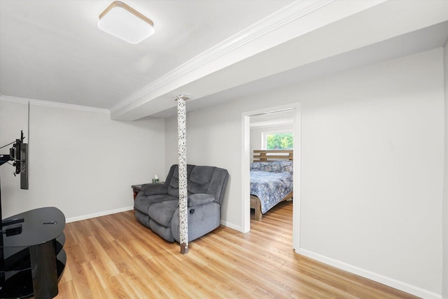 9451 Elm Ave, Mokena, IL 60448 - sitting room featuring crown molding and light wood finished floors
