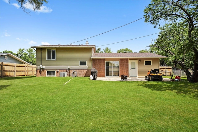 9451 Elm Ave, Mokena, IL 60448 - back of house featuring a fenced backyard, a patio, and brick siding