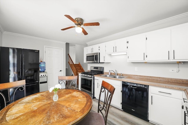 9451 Elm Ave, Mokena, IL 60448 - kitchen with black appliances, crown molding, a ceiling fan, light wood-style flooring, and white cabinets
