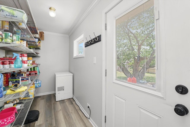 9451 Elm Ave, Mokena, IL 60448 - washroom with crown molding and wood finished floors