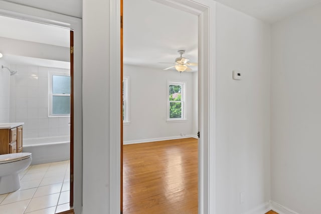 10410 S Walden Pkwy Unit 2N, Chicago, IL 60643 - hallway with baseboards and light wood-type flooring