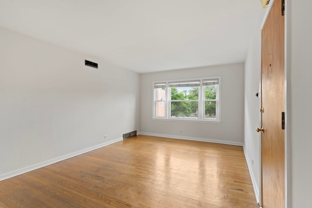10410 S Walden Pkwy Unit 2N, Chicago, IL 60643 - spare room with light wood finished floors and baseboards