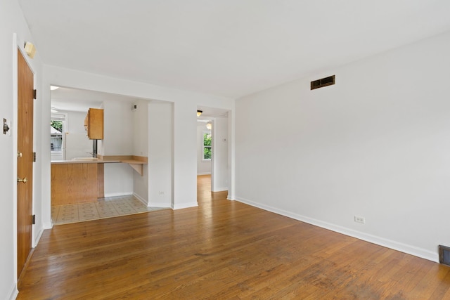 10410 S Walden Pkwy Unit 2N, Chicago, IL 60643 - unfurnished living room with wood finished floors