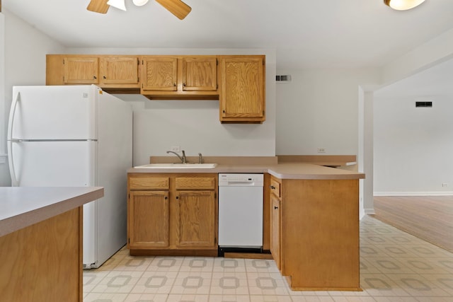 10410 S Walden Pkwy Unit 2N, Chicago, IL 60643 - kitchen featuring white appliances, a peninsula, ceiling fan, light countertops, and light flooring