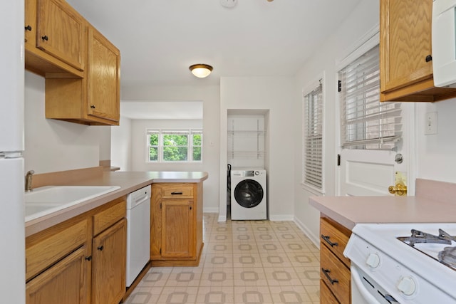 10410 S Walden Pkwy Unit 2N, Chicago, IL 60643 - kitchen featuring washer / dryer, white appliances, light countertops, and light floors