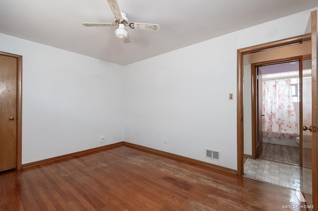 5444 S Kedvale Ave, Chicago, IL 60632 - unfurnished room featuring ceiling fan and wood finished floors