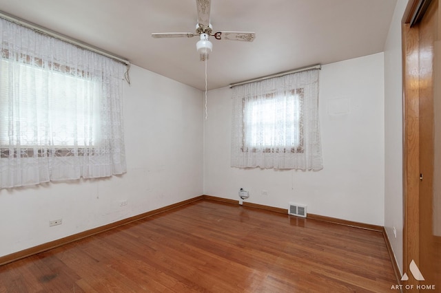 5444 S Kedvale Ave, Chicago, IL 60632 - unfurnished room featuring wood finished floors and a ceiling fan